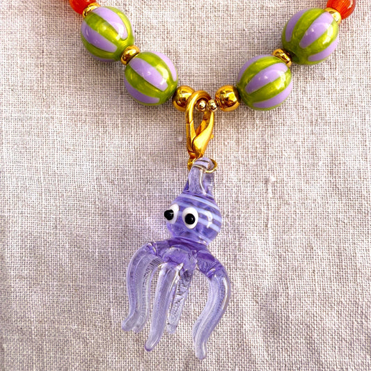 Orange beaded necklace with purple glass octopus pendant Madame Octopussy by Studio Gløra