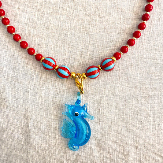 Red jade bead necklace with blue glass seahorse pendant Señorita Seahorse by Studio Gløra