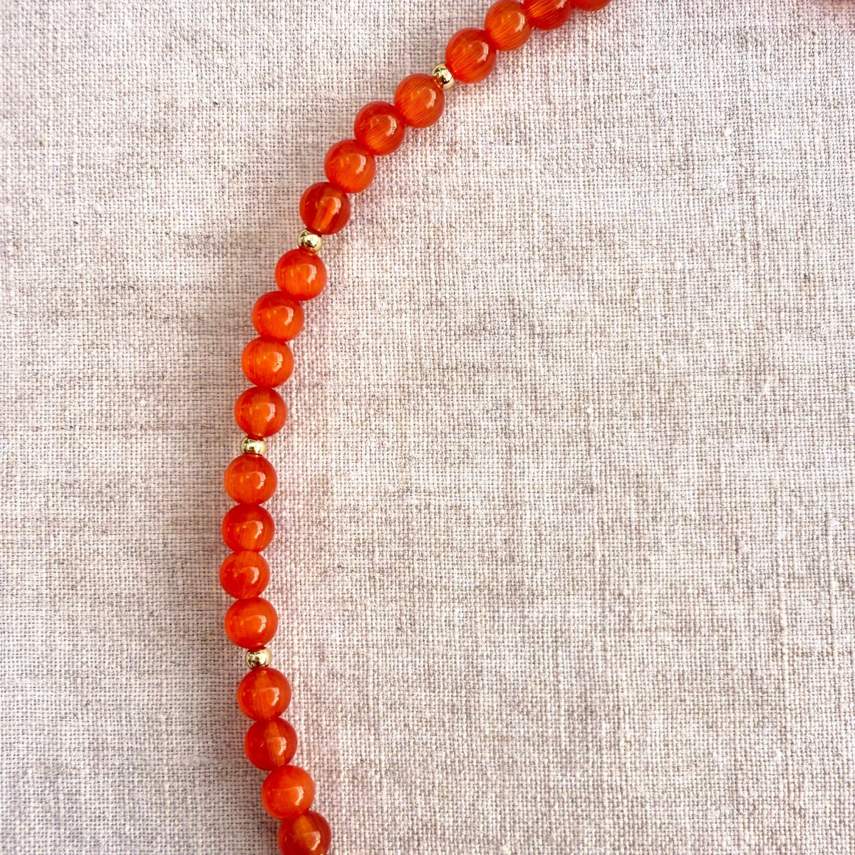 Orange beaded necklace with purple glass octopus pendant Madame Octopussy by Studio Gløra