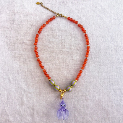 Orange beaded necklace with purple glass octopus pendant Madame Octopussy by Studio Gløra