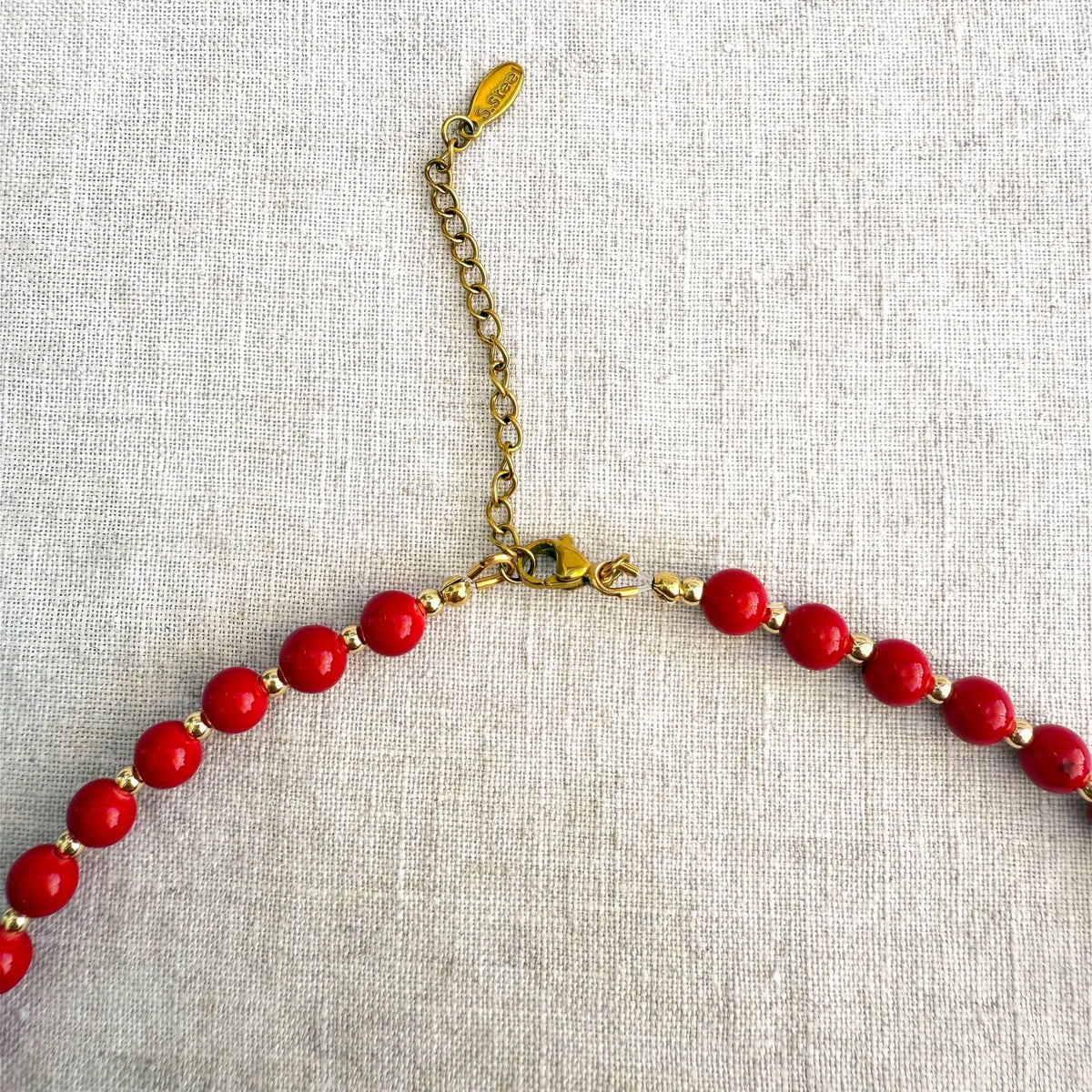 Red jade bead necklace with blue glass seahorse pendant Señorita Seahorse by Studio Gløra
