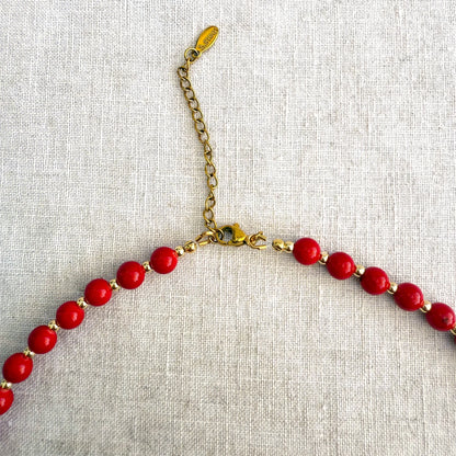 Red jade bead necklace with blue glass seahorse pendant Señorita Seahorse by Studio Gløra