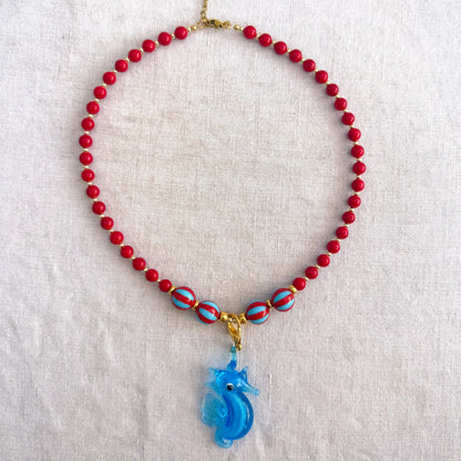 Red jade bead necklace with blue glass seahorse pendant Señorita Seahorse by Studio Gløra