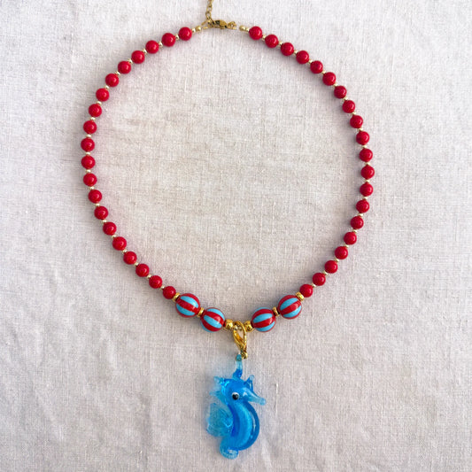Red jade bead necklace with blue glass seahorse pendant Señorita Seahorse by Studio Gløra